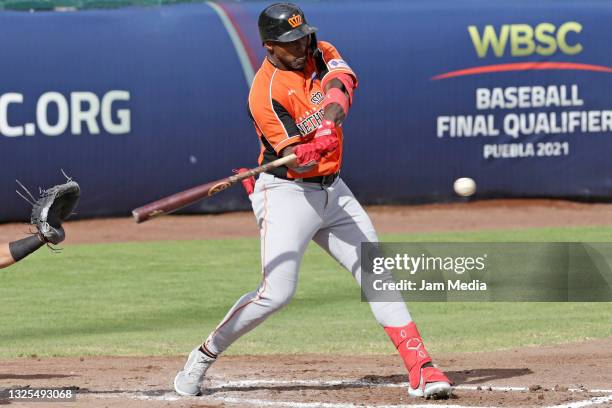 Yurendell DeCaster of Netherlands bats at the first inning during a WBSC baseball final qualifier between Venezuela and Netherlands at Hermanos...