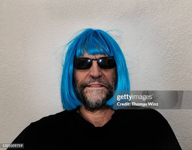 man with blue wig and beard - toupee stock pictures, royalty-free photos & images