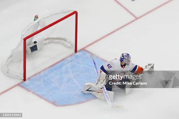 Semyon Varlamov of the New York Islanders allows a goal to Yanni Gourde , of the Tampa Bay Lightning during the second period in Game Seven of the...