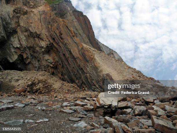 huge landslide at playa de campiecho or campiechos, principado de asturias - landslide stock pictures, royalty-free photos & images