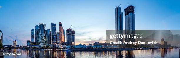 moscow skyscrapers panorama in the evening. - moscow skyline stock pictures, royalty-free photos & images