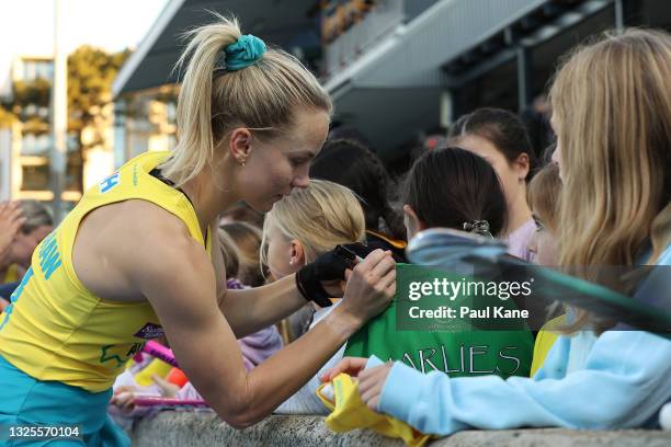 Stephanie Kershaw of the Hockeyroos signs autographs following the FIH Pro League match between the Australian Hockeyroos and the New Zealand Black...