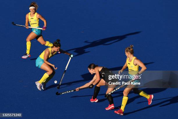 Brooke Peris of the Hockeyroos blocks a pass by Tarryn Davey of the Black Sticks during the FIH Pro League match between the Australian Hockeyroos...