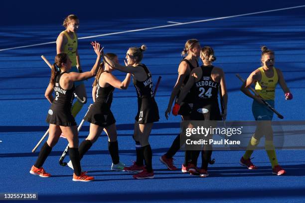 Olivia Shannon and Stacey Michelsen of the Black Sticks celebrate a goal during the FIH Pro League match between the Australian Hockeyroos and the...