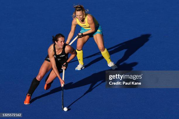 Olivia Shannon of the Black Sticks controls the ball against Greta Hayes of the Hockeyroos during the FIH Pro League match between the Australian...