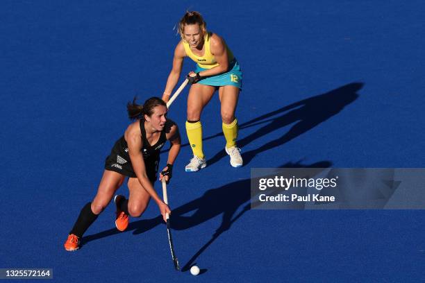 Olivia Shannon of the Black Sticks controls the ball against Greta Hayes of the Hockeyroos during the FIH Pro League match between the Australian...