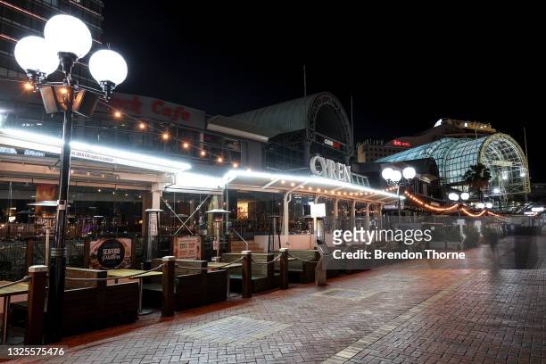 General view of closed restaurants in Darling Harbour due to Covid-19 on June 26, 2021 in Sydney, Australia. Lockdown restrictions have come into...