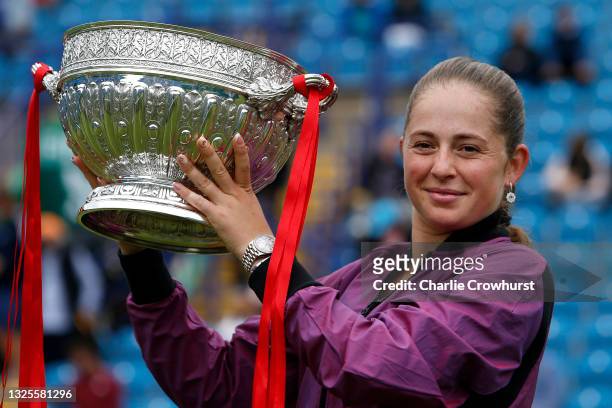 Jelena Ostapenko of Latvia poses for a photo with the trophy after winning the women's singles final aganst Anett Kontaveit of Estonia during day 8...