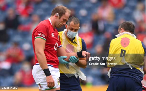 Lions captain Alun Wyn Jones is led from the field by medics during the 1888 Cup match between British & Irish Lions and Japan at BT Murrayfield...