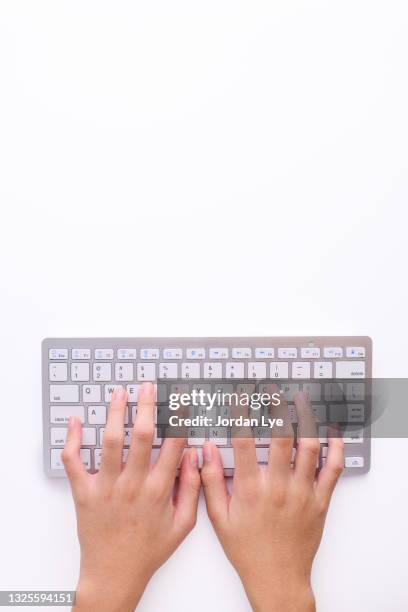 person hands typing on computer keyboard - tastiera di computer foto e immagini stock