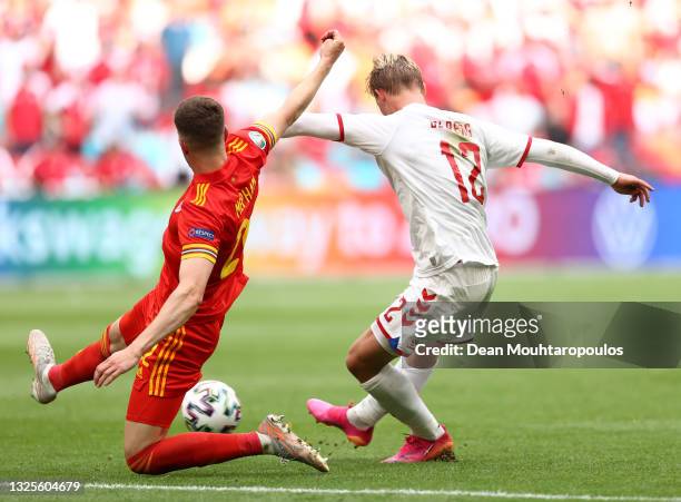Kasper Dolberg of Denmark scores their side's first goal during the UEFA Euro 2020 Championship Round of 16 match between Wales and Denmark at Johan...
