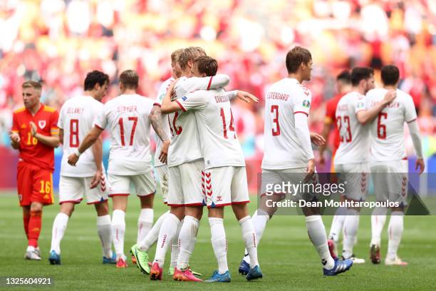Kasper Dolberg of Denmark celebrates with team mates after scoring their side's first goal during the UEFA Euro 2020 Championship Round of 16 match...