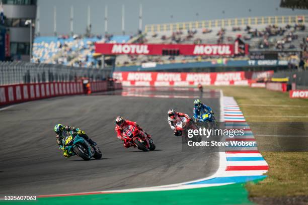 Valentino Rossi of Italy and Petronas Yamaha SRT rides in front of Jack Miller, Johann Zarco and Joan Mir during the MotoGP qualifying session at TT...