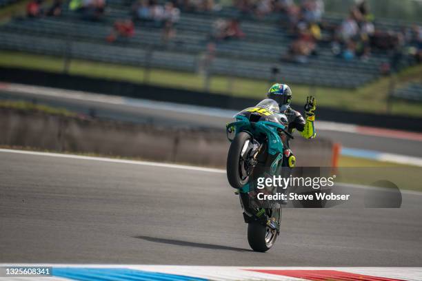 Valentino Rossi of Italy and Petronas Yamaha SRT rides a wheelie during the MotoGP qualifying session at TT Circuit Assen on June 26, 2021 in Assen,...