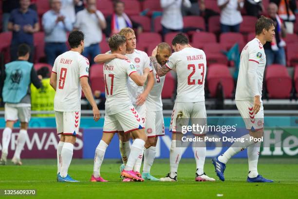 Kasper Dolberg of Denmark celebrates with team mates after scoring their side's second goal during the UEFA Euro 2020 Championship Round of 16 match...