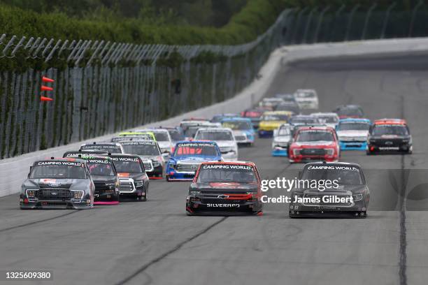 Kyle Busch, driver of the Cessna Toyota, Zane Smith, driver of the ARLON SLX+ Chevrolet, and Todd Gilliland, driver of the Frontline Enterprises Inc...