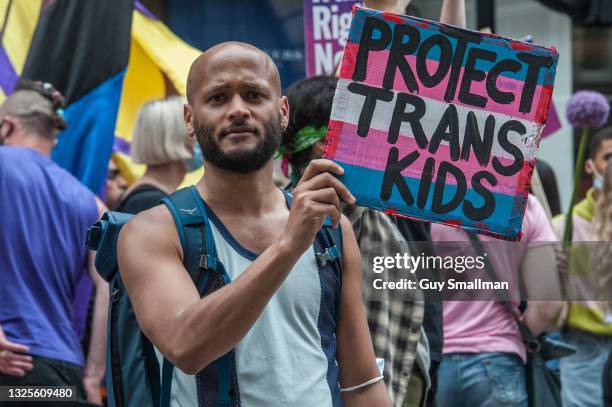 Protestor reacts to the camera as thousands attend the third Trans Pride march on June 26, 2021 in London, England.