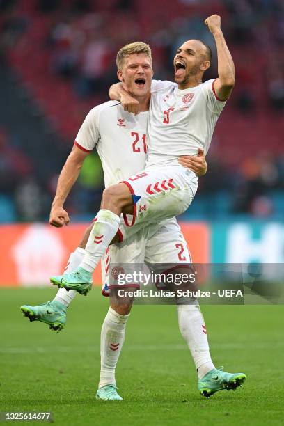 Martin Braithwaite of Denmark celebrates with Andreas Cornelius after scoring their side's fourth goal during the UEFA Euro 2020 Championship Round...