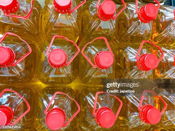 olive oil bottles - oil bottle stock pictures, royalty-free photos & images