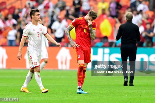 Joe Rodon of Wales looks dejected following defeat in the UEFA Euro 2020 Championship Round of 16 match between Wales and Denmark at Johan Cruijff...