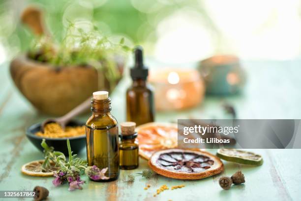 essential oils background - homeopathic medicine stock pictures, royalty-free photos & images