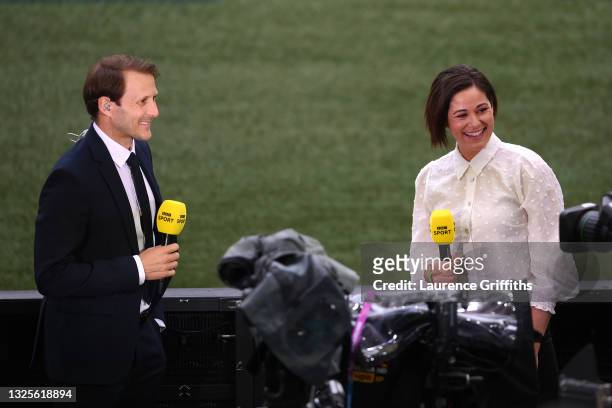 Presenters, Gaizka Mendieta and Eilidh Barbour look on prior to the UEFA Euro 2020 Championship Round of 16 match between Italy and Austria at...