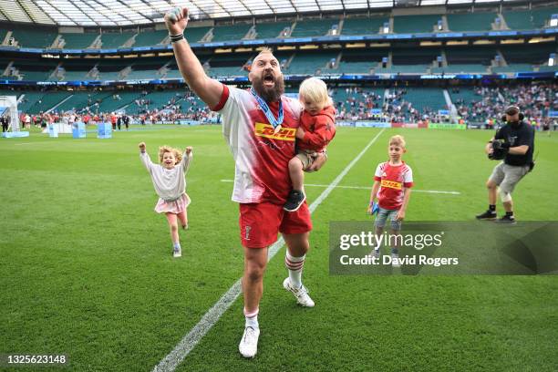 Joe Marler of Harlequins celebrates with his children following his side's victory during the Gallagher Premiership Rugby Final between Exeter Chiefs...