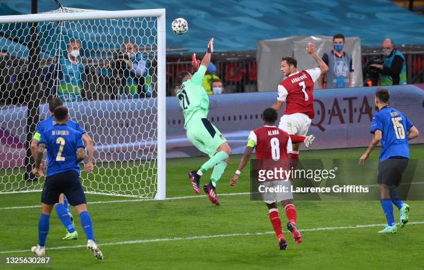 Marko Arnautovic of Austria scores a goal past Gianluigi Donnarumma of Italy that was later disallowed by VAR for offside during the UEFA Euro 2020...