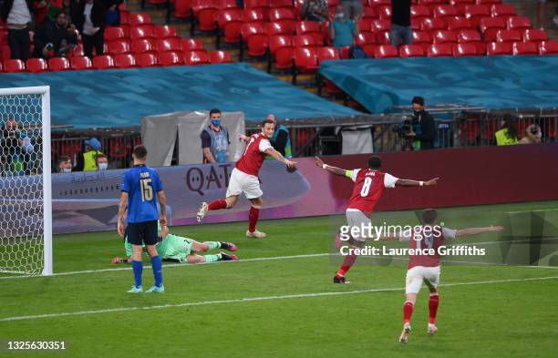 Marko Arnautovic of Austria celebrates scoring a goal which is later disallowed by VAR during the UEFA Euro 2020 Championship Round of 16 match...