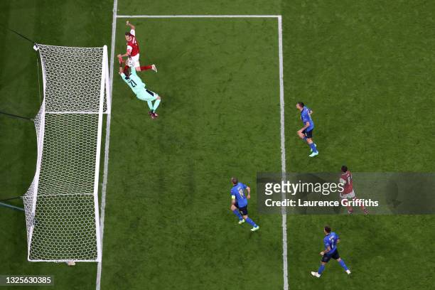 Marko Arnautovic of Austria scores a goal past Gianluigi Donnarumma of Italy that was later disallowed by VAR for offside during the UEFA Euro 2020...