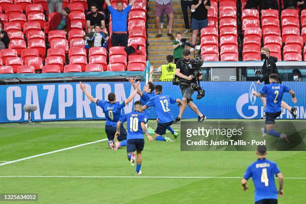 Federico Chiesa of Italy celebrates after scoring their side's first goal during the UEFA Euro 2020 Championship Round of 16 match between Italy and...