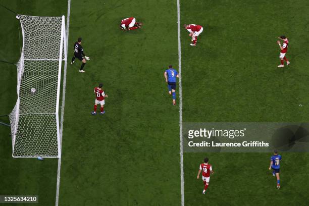 Daniel Bachmann, David Alaba, Martin Hinteregger and Florian Grillitsch of Austria look dejected after the Italy first goal scored by Federico Chiesa...