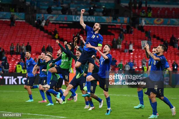 Leonardo Bonucci of Italy and teammates celebrate after victory in the UEFA Euro 2020 Championship Round of 16 match between Italy and Austria at...