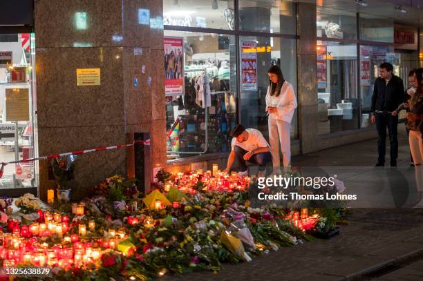 People lay flowers and candles at the site of a fatal attack by a knife-wielding man on June 26, 2021 in Wurzburg, Germany. Abdirahman J. A. Who...