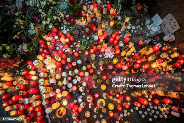 People lay flowers and candles near the site of a fatal attack by a knife-wielding man on June 26, 2021 in Wurzburg, Germany. Abdirahman J. A. Who...