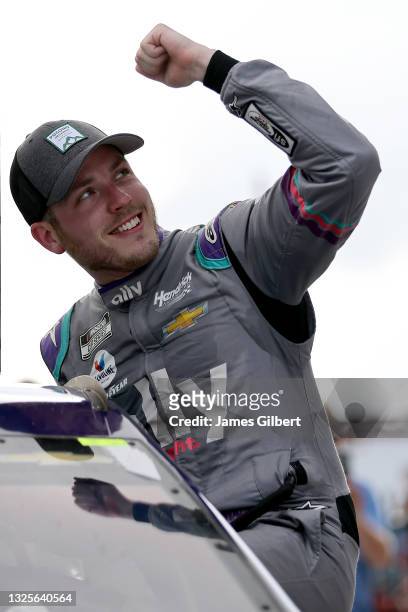 Alex Bowman, driver of the Ally Chevrolet, celebrates in victory lane after winning the NASCAR Cup Series Pocono Organics CBD 325 at Pocono Raceway...