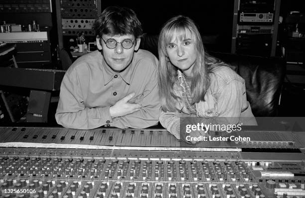 American singer-songwriter, Melissa Etheridge, with English record producer and engineer, Hugh Padgham, in a Los Angeles recording studio, circa...