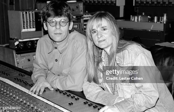 American singer-songwriter, Melissa Etheridge, with English record producer and engineer, Hugh Padgham in a Los Angeles recording studio, circa...