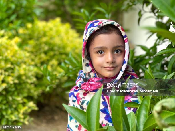 little cute muslim girl with hijab - iranian girl fotografías e imágenes de stock