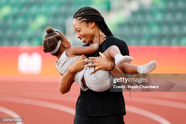 Allyson Felix celebrates with her daughter Camryn after day nine of the 2020 U.S. Olympic Track & Field Team Trials at Hayward Field on June 26, 2021...