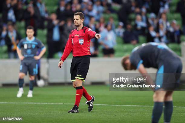 Referee Chris Beath points to the spot and awards a penalty to Melbourne City during the A-League Grand Final match between Melbourne City and Sydney...