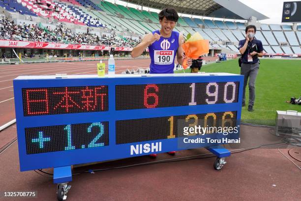 Shunsuke Izumiya poses for photographers after winning Men's 110m Hurdles final with new national record during the 105th Japan Athletics...