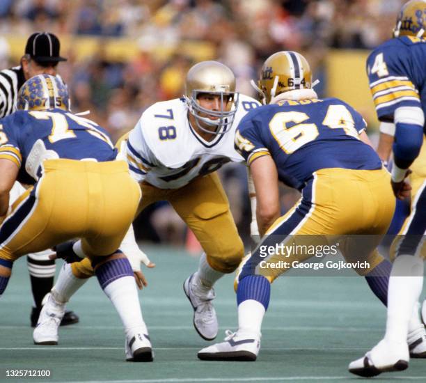 Defensive lineman Mike Gann of the University of Notre Dame Fighting Irish looks across the line of scrimmage during a college football game against...