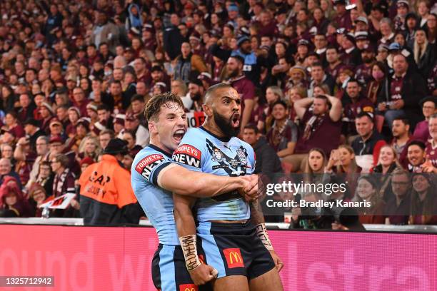 Josh Addo-Carr of the Blues celebrates with team mate Cameron Murray of the Blues after scoring a try during game two of the 2021 State of Origin...