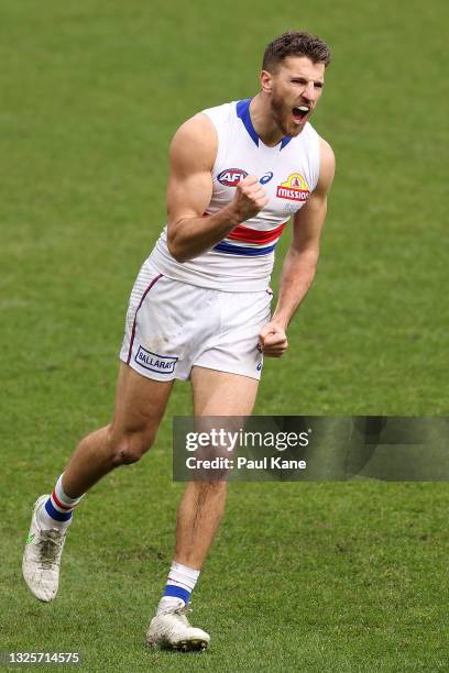 Marcus Bontempelli of the Bulldogs celebrates a goal during the round 15 AFL match between the West Coast Eagles and the Western Bulldogs at Optus...