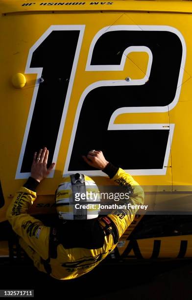 Sam Hornish Jr., driver of the Alliance Truck Parts Dodge, celebrates after winning the NASCAR Nationwide Series WYPALL 200 at Phoenix International...