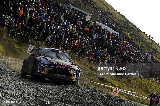 Sebastien Ogier of France and Julien Ingrassia of France compete in their Citroen Total WRT Citroen DS3 WRC during Day3 of the WRC Wales Rally GB on...