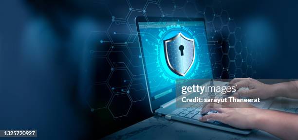 highly secure it device protection shield. blue background - threats stockfoto's en -beelden