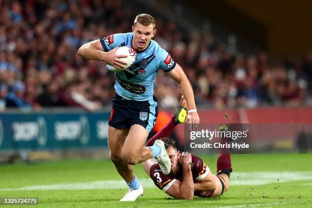 Tom Trbojevic of the Blues makes a break during game two of the 2021 State of Origin series between the Queensland Maroons and the New South Wales...