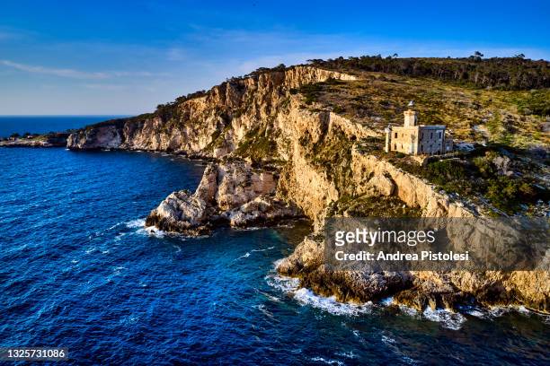 san domino lighthouse, tremiti islands, italy - isole tremiti stock pictures, royalty-free photos & images